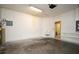 A utilitarian garage space with concrete floors and a convenient utility sink at 1086 Wickerwood St, Ocoee, FL 34761