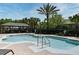 Enjoy a refreshing swim in the community pool with lounge chairs and shaded seating area at 1086 Wickerwood St, Ocoee, FL 34761