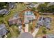 Aerial view of the property showcasing the pool, backyard, surrounding landscape and the neighborhood at 1115 Marni Ridge Ct, Kissimmee, FL 34747