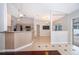 Well-lit kitchen with sleek appliances, breakfast bar, and easy access to pool area at 1115 Marni Ridge Ct, Kissimmee, FL 34747