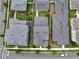 Aerial view of luxury homes with manicured lawns, mature trees, and landscaped backyard with pergolas at 1206 Civitas Way, Winter Garden, FL 34787