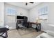 Bright office space with dual windows, desk, and office chair at 1206 Civitas Way, Winter Garden, FL 34787