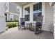 Cozy front porch with rocking chairs, creating a charming and inviting outdoor space to relax and enjoy at 1206 Civitas Way, Winter Garden, FL 34787