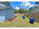Backyard with blue pots and grass at 1407 S Palmetto Ave, Sanford, FL 32771