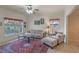 Bright living room with comfortable furnishings and views of the landscaped yard at 1407 S Palmetto Ave, Sanford, FL 32771