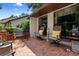 Cozy brick patio with comfortable seating, offering a relaxing outdoor space at 154 Golf Club Dr # 154, Longwood, FL 32779