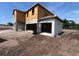 House under construction with visible concrete blocks and wooden framing, sitting on a dirt lot at 1646 Cane Bamboo Drive, St Cloud, FL 34771