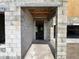Interior view of new construction showcasing concrete block walls and wooden framing, and concrete flooring at 1646 Cane Bamboo Drive, St Cloud, FL 34771