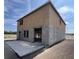Exterior image of a home under construction, featuring concrete block construction and an attached unfinished garage at 1646 Cane Bamboo Drive, St Cloud, FL 34771