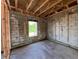 Image of the concrete block interior of a home under construction with exposed ceiling beams and window framing at 1646 Cane Bamboo Drive, St Cloud, FL 34771