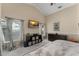 Bright main bedroom features neutral walls, modern décor, and lots of natural light at 182 Westmoreland Cir, Kissimmee, FL 34744
