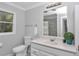 Bathroom featuring toilet, modern vanity with sink, and enclosed shower at 1836 Se 6Th Ave, Ocala, FL 34471