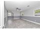 Bedroom with stylish two-tone paint, ceiling fan, and sliding doors, blending comfort and modern design at 1836 Se 6Th Ave, Ocala, FL 34471