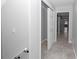 Hallway features elegant flooring and recessed lighting, creating a seamless transition between spaces at 1836 Se 6Th Ave, Ocala, FL 34471