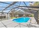 A beautiful pool enclosed by a screened-in lanai at 1836 Se 6Th Ave, Ocala, FL 34471
