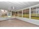Bright sunroom featuring tile floor and many windows at 1836 Se 6Th Ave, Ocala, FL 34471