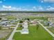 Neighborhood aerial view featuring single-Gathering homes, well-maintained lawns, and community streets at 200 Cimarron Dr, Kissimmee, FL 34759