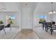 Inviting foyer leads to a dining room and living room with tile entry and neutral walls at 200 Cimarron Dr, Kissimmee, FL 34759