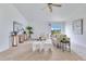 Inviting living room with a ceiling fan, neutral decor, plush seating, and a sliding glass door for natural light at 200 Cimarron Dr, Kissimmee, FL 34759