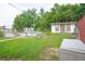 Backyard showcasing a small shed and an above ground pool at 2112 Plymouth Sorrento Rd, Apopka, FL 32712