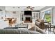 Inviting living room with tile flooring, fireplace and dining area, perfect for entertaining guests at 2112 Plymouth Sorrento Rd, Apopka, FL 32712