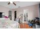 Bedroom featuring a door leading to the bathroom and walk-in closet at 214 Majors Ln # B, Kissimmee, FL 34743