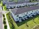 Aerial view of townhome community with well-maintained lawns and exteriors at 224 Nine Iron Dr, Davenport, FL 33896