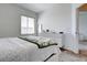 Bright bedroom features a window, dresser, and a plush carpet for a cozy feel at 224 Nine Iron Dr, Davenport, FL 33896