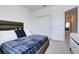 Comfortable bedroom features a modern design and convenient closet access at 224 Nine Iron Dr, Davenport, FL 33896