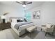 Comfortable bedroom with a plush bed, neutral color palette, and modern furnishings at 2580 Grassy Point Dr # 106, Lake Mary, FL 32746