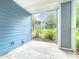 Screened-in patio with tile flooring and a view of the landscaped common area at 2580 Grassy Point Dr # 106, Lake Mary, FL 32746
