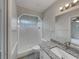 Bathroom with vanity, granite countertop, shower and tiled floor at 2710 Wyndham Ln, Orlando, FL 32808