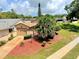 Charming single-story home with well-maintained landscaping and a cozy front yard at 2922 Burlington Dr, Apopka, FL 32703