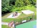 Community playground and swing set in a well maintained community surrounded by mature trees at 2922 Burlington Dr, Apopka, FL 32703
