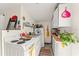 Well-organized kitchen featuring white cabinets and a full-size oven at 314 E Harwood St, Orlando, FL 32801