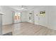Bright living room with fresh neutral paint, laminate flooring, and natural light at 314 E Harwood St, Orlando, FL 32801