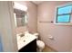 The bathroom features a vanity, toilet and shower and tiled walls at 337 Live Oak Blvd, Sanford, FL 32773
