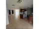 Spacious kitchen featuring tile flooring, laminate countertops, and a breakfast nook at 337 Live Oak Blvd, Sanford, FL 32773