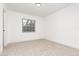 Bright bedroom features neutral carpet, natural light from the window, and fresh white walls at 407 Ventura Dr, Sanford, FL 32773