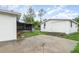 A view of the exterior of the home with a screened in porch and storage building at 407 Ventura Dr, Sanford, FL 32773