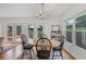 Bright dining room with sliding doors to the outdoor deck for seamless indoor/outdoor living at 424 E Muriel St, Orlando, FL 32806