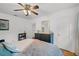 Comfortable main bedroom featuring hardwood floors and modern decor at 424 E Muriel St, Orlando, FL 32806