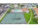 Enjoy community amenities, including a pool and tennis courts, located near the residential buildings at 5126 Saint Charles Ln # 43, Orlando, FL 32822