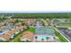 Great aerial view highlighting the proximity of community to retail and other commercial services at 5126 Saint Charles Ln # 43, Orlando, FL 32822