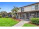 Enjoy the outdoors in this home with screened-in back porch, walkway, and lovely landscaping at 5126 Saint Charles Ln # 43, Orlando, FL 32822