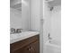 Bathroom featuring a shower/tub combo with tiled walls and a vanity sink at 5126 Saint Charles Ln # 43, Orlando, FL 32822