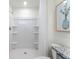 Bathroom shower features white surround, multiple shelves and granite countertop at 6006 Galloping Dr, Apopka, FL 32712