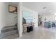 Welcoming entryway with table, decor, and staircase leading to the upper level at 6006 Galloping Dr, Apopka, FL 32712