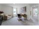 Bright office space with neutral tones and a comfortable sitting area at 6006 Galloping Dr, Apopka, FL 32712
