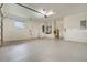 Spacious garage features high ceilings and ample room for storage and parking at 6609 Crenshaw Drive, Orlando, FL 32835